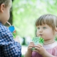 Children Drinking Juice Box