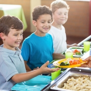 Boys Eating School Lunch