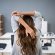 Business Woman Stretching at desk