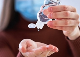 Woman with Hand Sanitizer