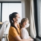 Mother & Daughter at home with masks