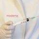 Scientist Holding Moderna Vaccine