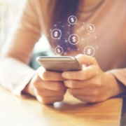 Girl Managing Money Through Phone