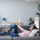 Woman Reading on Couch